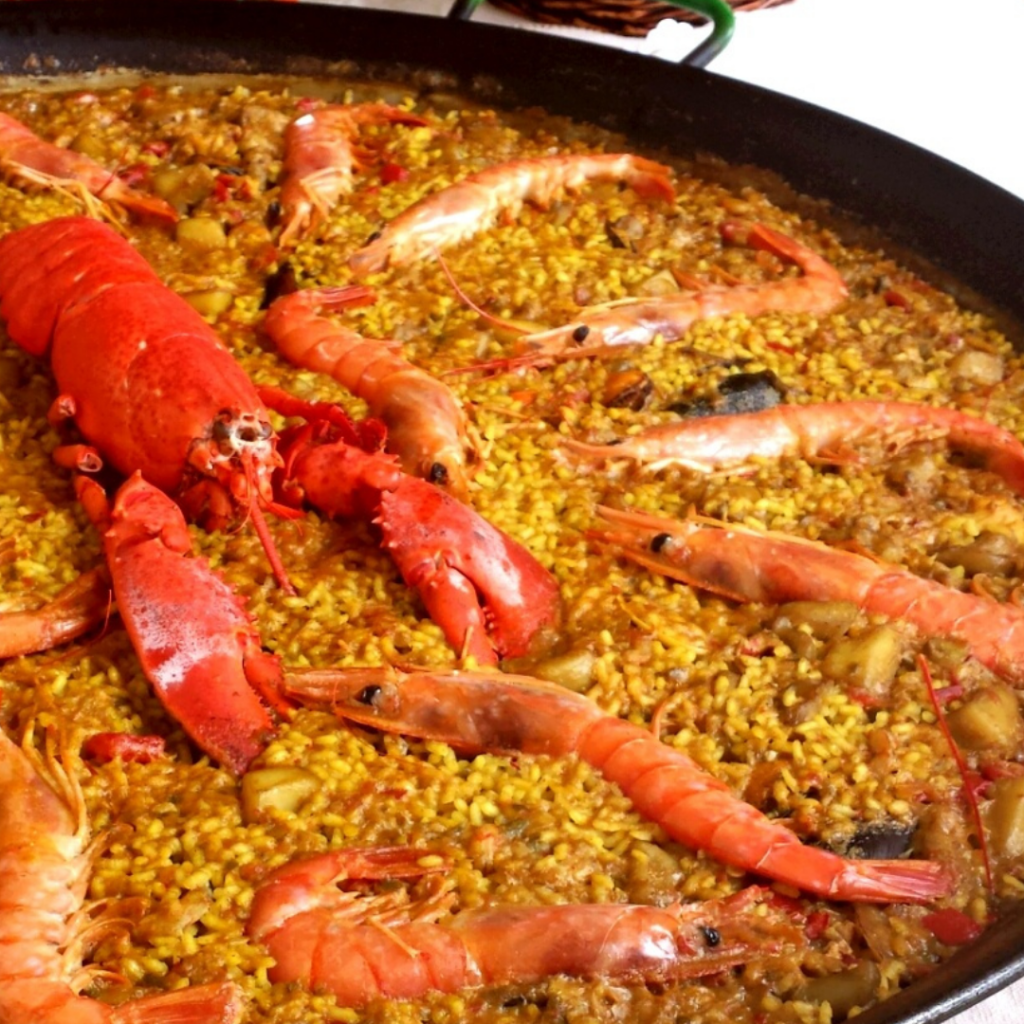 tapa de paella con espumoso Frizz